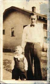 My grandfather with his father, before restoration