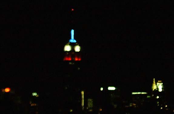 Empire State Building lit red, white and blue