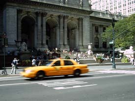 Cab passes NYPL
